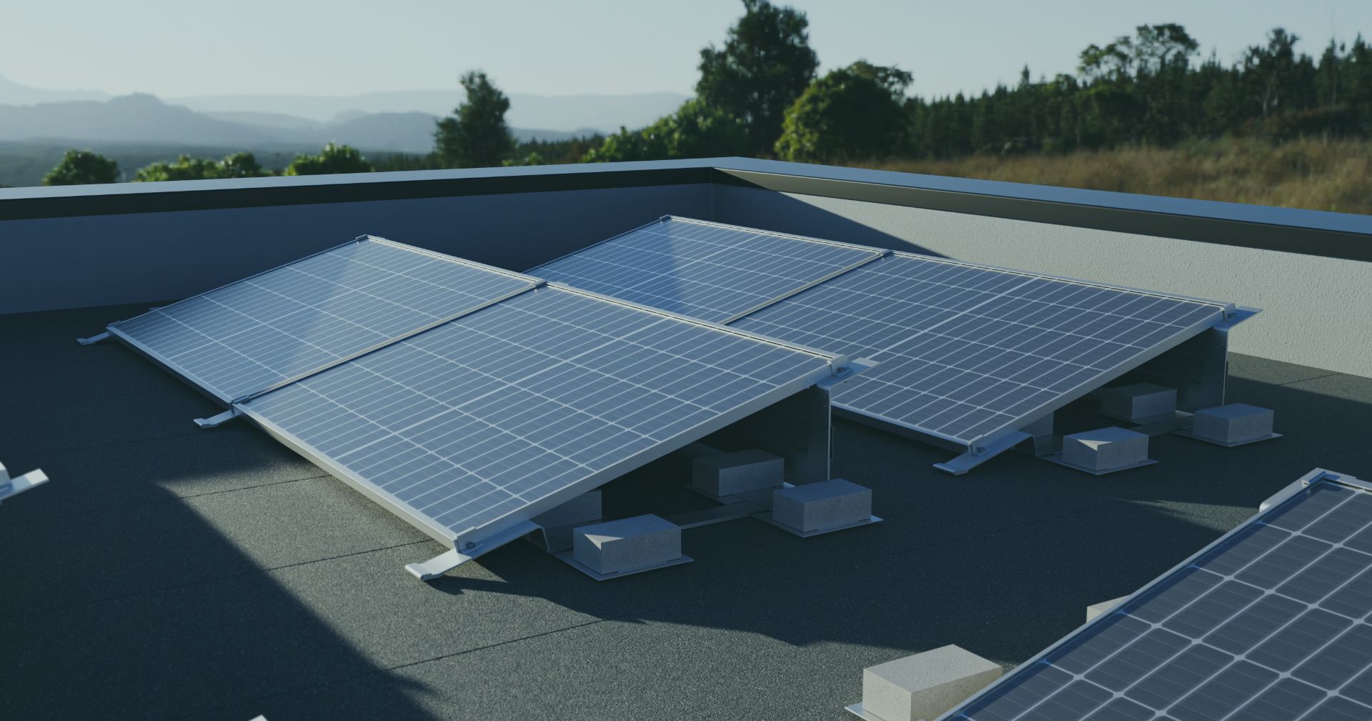 REKOSOL ballasted flat-roof mounting system installed on a large commercial rooftop